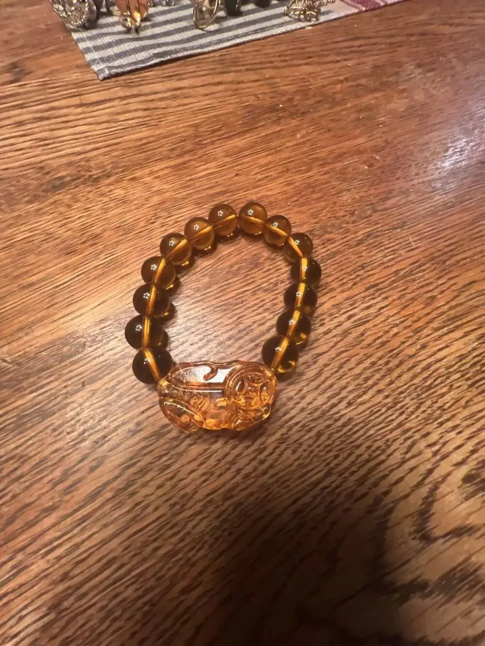 Feng Shui Citrine Bead Bracelet with Carved Pi Xiu Wealth Charm